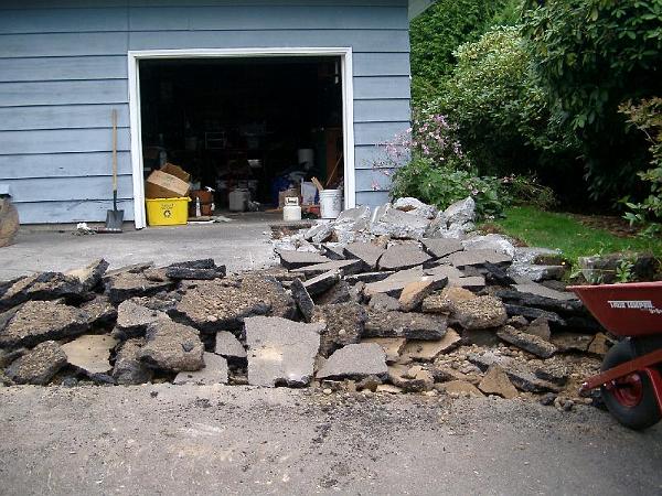 House 9.13.2004 00014.JPG - There goes the old driveway.  Rubble was recycled.  The original single car garage will become part of the new bedroom wing.
